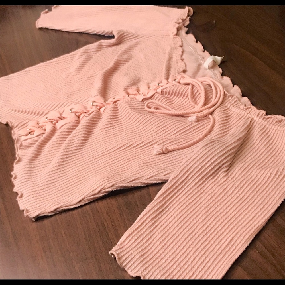 Cute pink laced up top